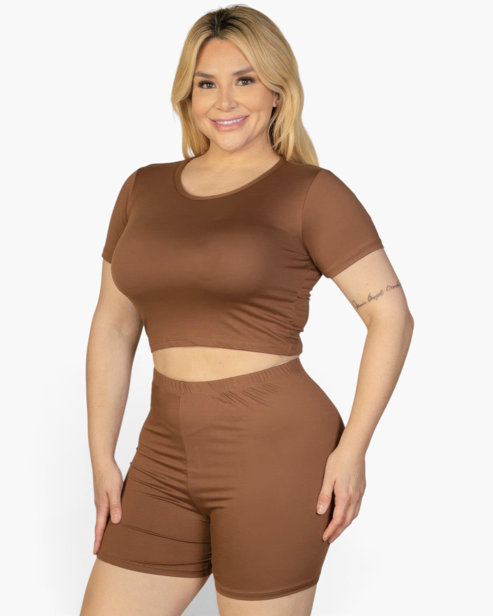 Beach Rose Co. plus size brown short sleeve crop top and shorts set on a smiling blonde model