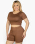 Beach Rose Co. plus size brown short sleeve crop top and shorts set on a smiling blonde model