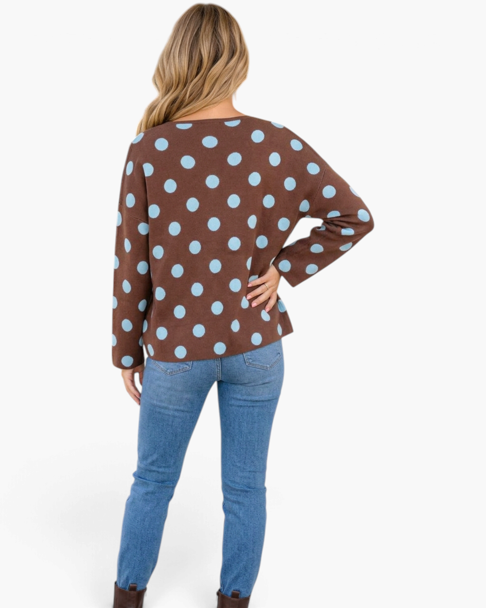Beach Rose Co. brown cardigan with light blue polka dots, drop shoulders, and long sleeves worn with blue jeans.