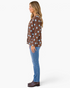 Beach Rose Co. brown cardigan with light blue polka dots, long sleeves, and button-front, worn with blue jeans.