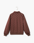 Beach Rose Co. brown long-sleeve pullover with white polka dots, pointed collar, and ribbed cuffs, back view.