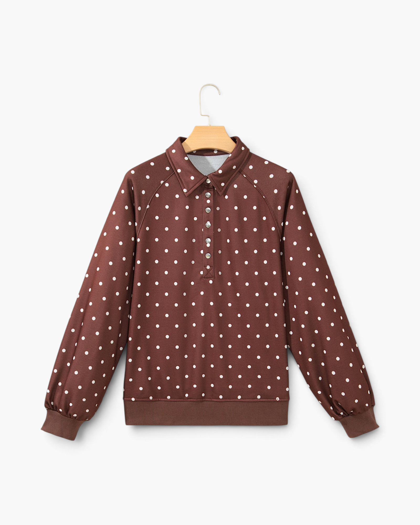 Beach Rose Co. brown polyester pullover with white polka dots, pointed collar, and snap-button neckline.