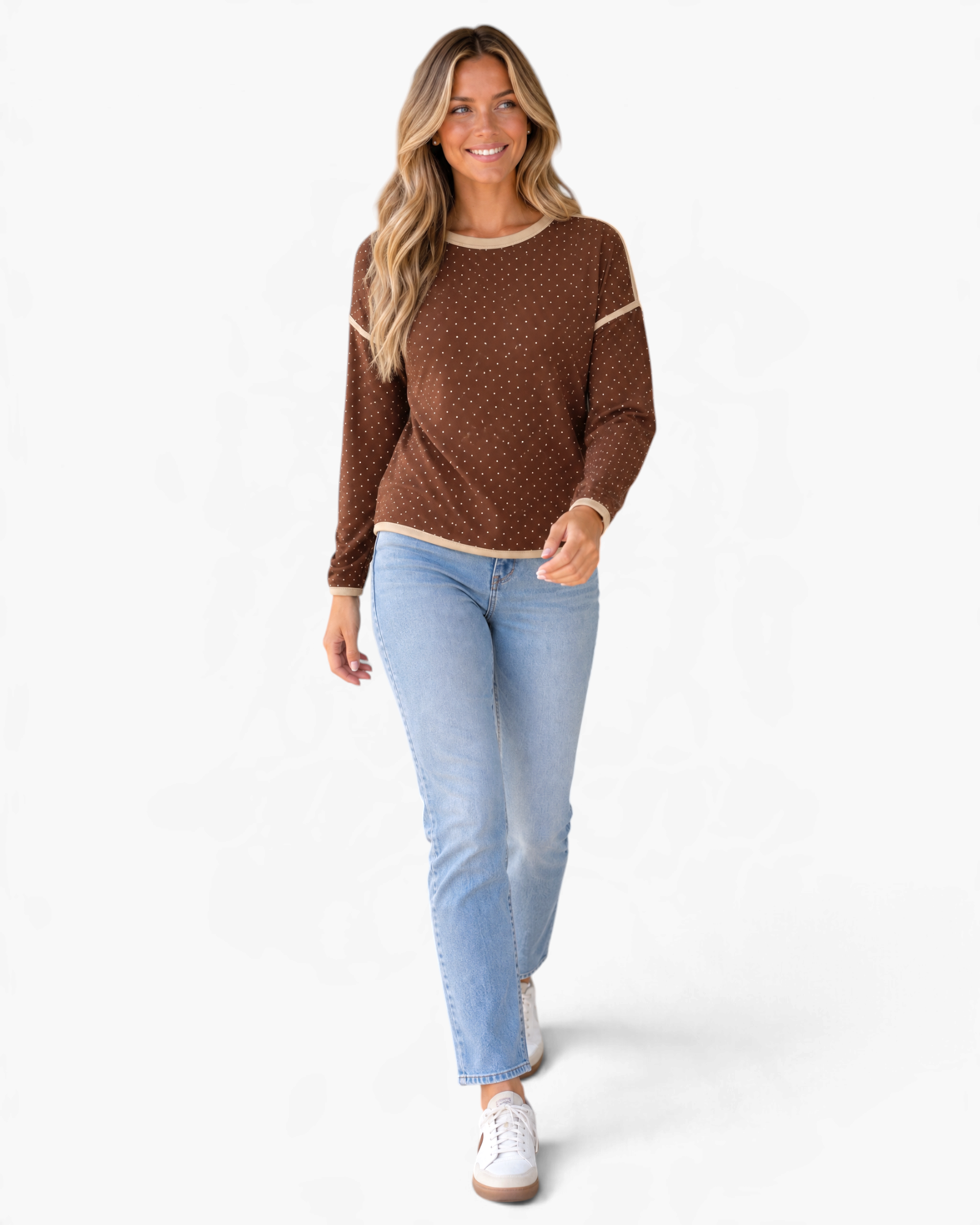 Beach Rose Co. brown long sleeve top with mini polka dots, cream contrast trim, and dropped shoulders on a model.