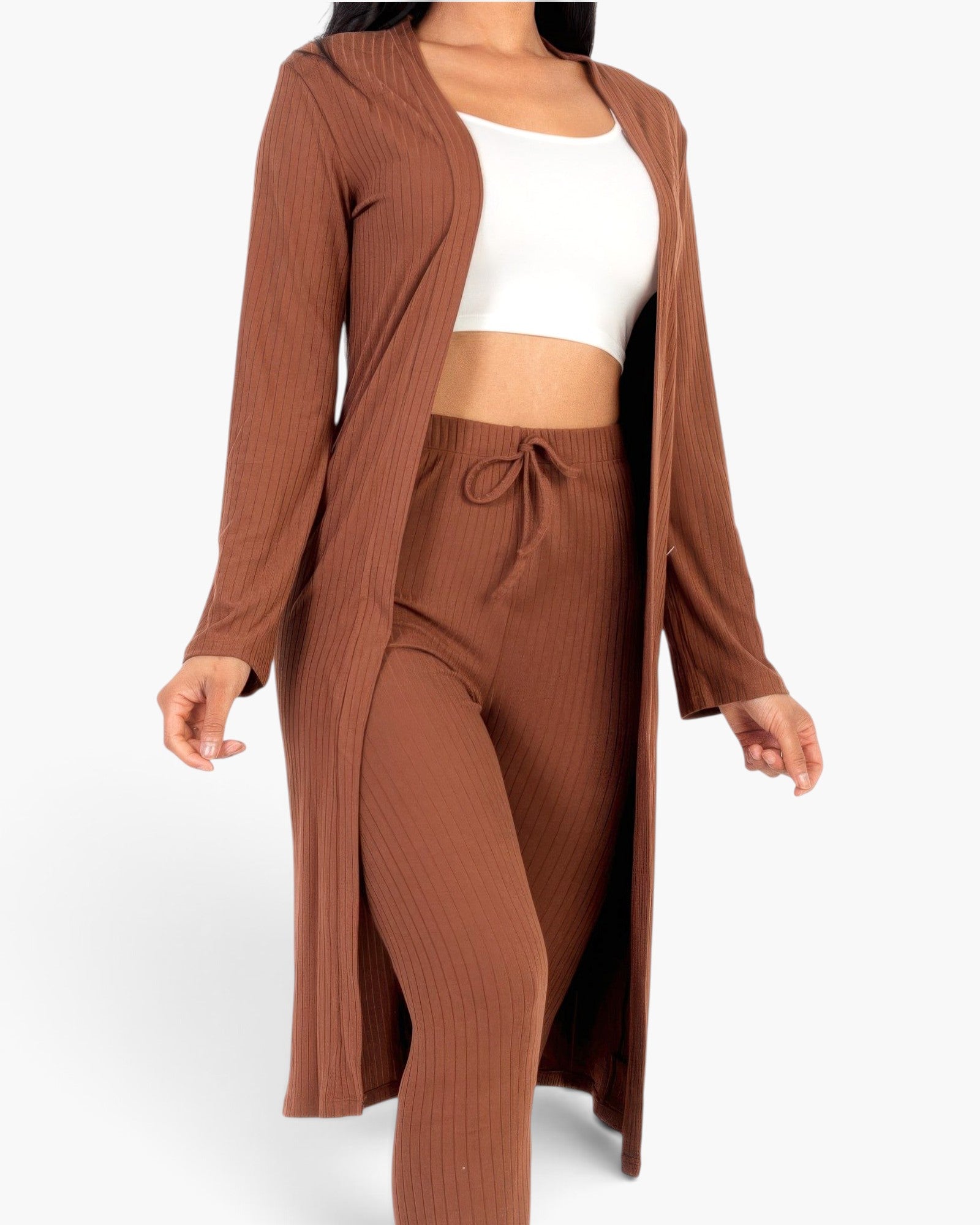 Beach Rose Co. brown ribbed long cardigan and matching leggings set worn with a white crop top on a model
