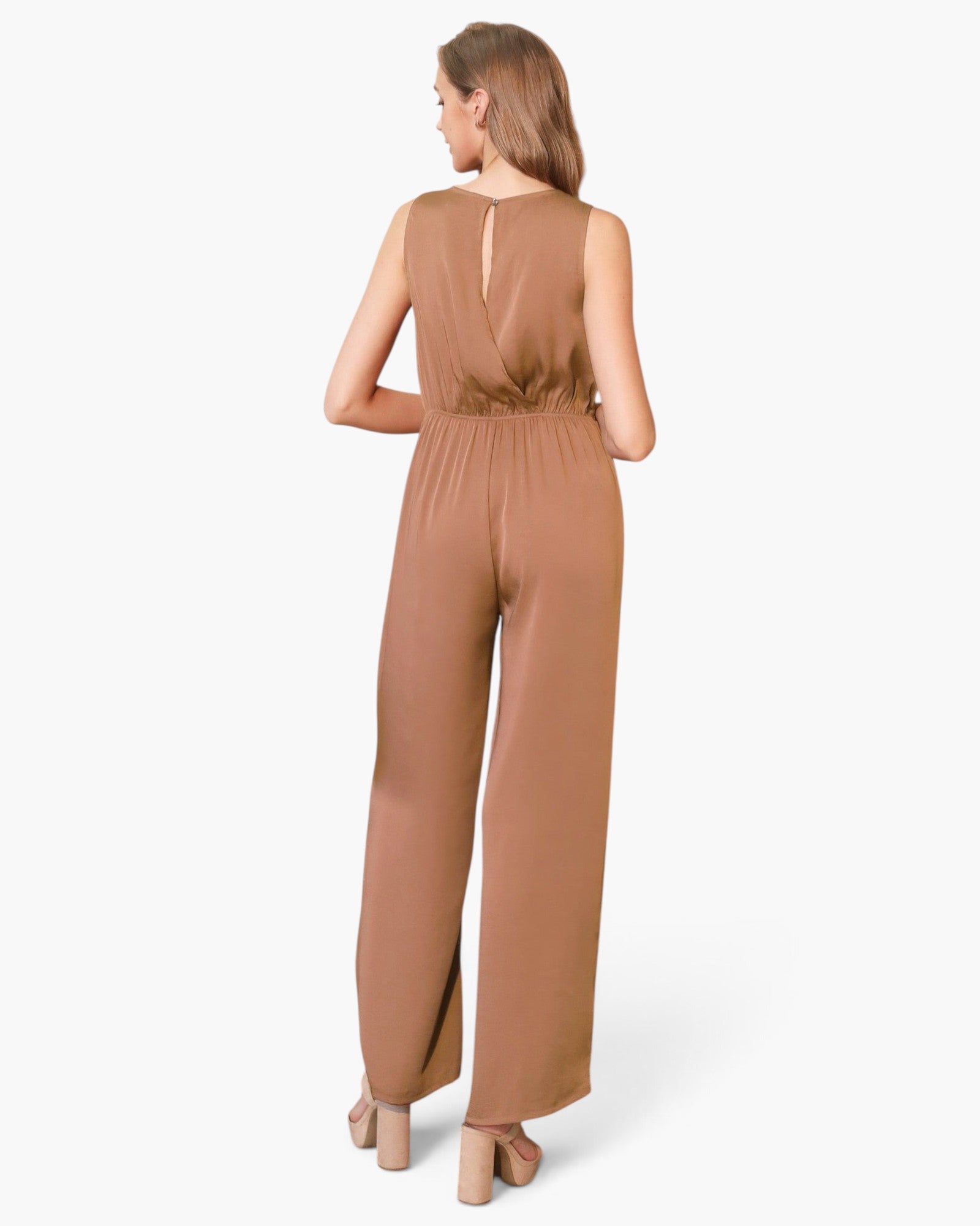 Beach Rose Co. brown washed poly silk jumpsuit with a sleeveless design and fluid wide-leg silhouette, back view.