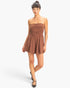 Beach Rose Co. brown strapless romper with shirred waist and relaxed shorts worn by a model on a white background