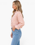 Beach Rose Co. brown and cream vertical striped button-up shirt with a pointed collar and chest pocket on a model.