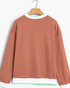 Beach Rose Co. brown relaxed fit sweatshirt with green and white striped trim on the crew neckline and hem.