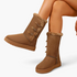 Beach Rose Co. brown suede mid-calf boots with faux fur trim and three side toggle fastenings on a model