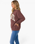 Beach Rose Co. brown mock neck sweatshirt with cream THANKFUL graphic, worn by a blonde model in profile view.
