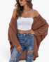 Beach Rose Co. brown waffle knit longline cardigan with an open-front design and dropped shoulders worn over a tank top