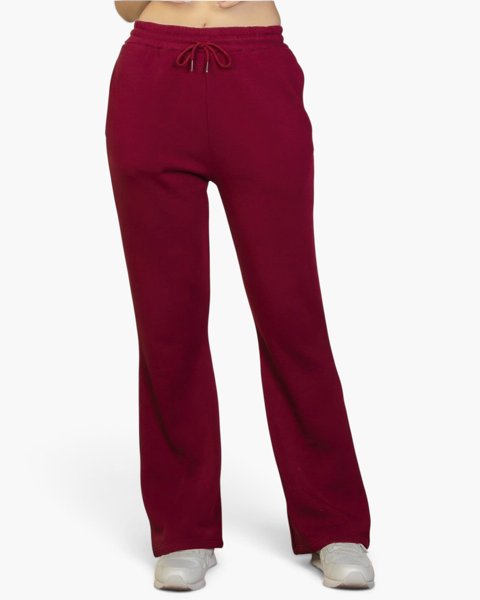 Beach Rose Co. burgundy bootcut sweatpants with a drawstring waist and slant pockets worn with white sneakers