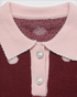 Beach Rose Co. burgundy knit sweater with blush polka dots, scalloped polo collar, and pearl-look button placket.