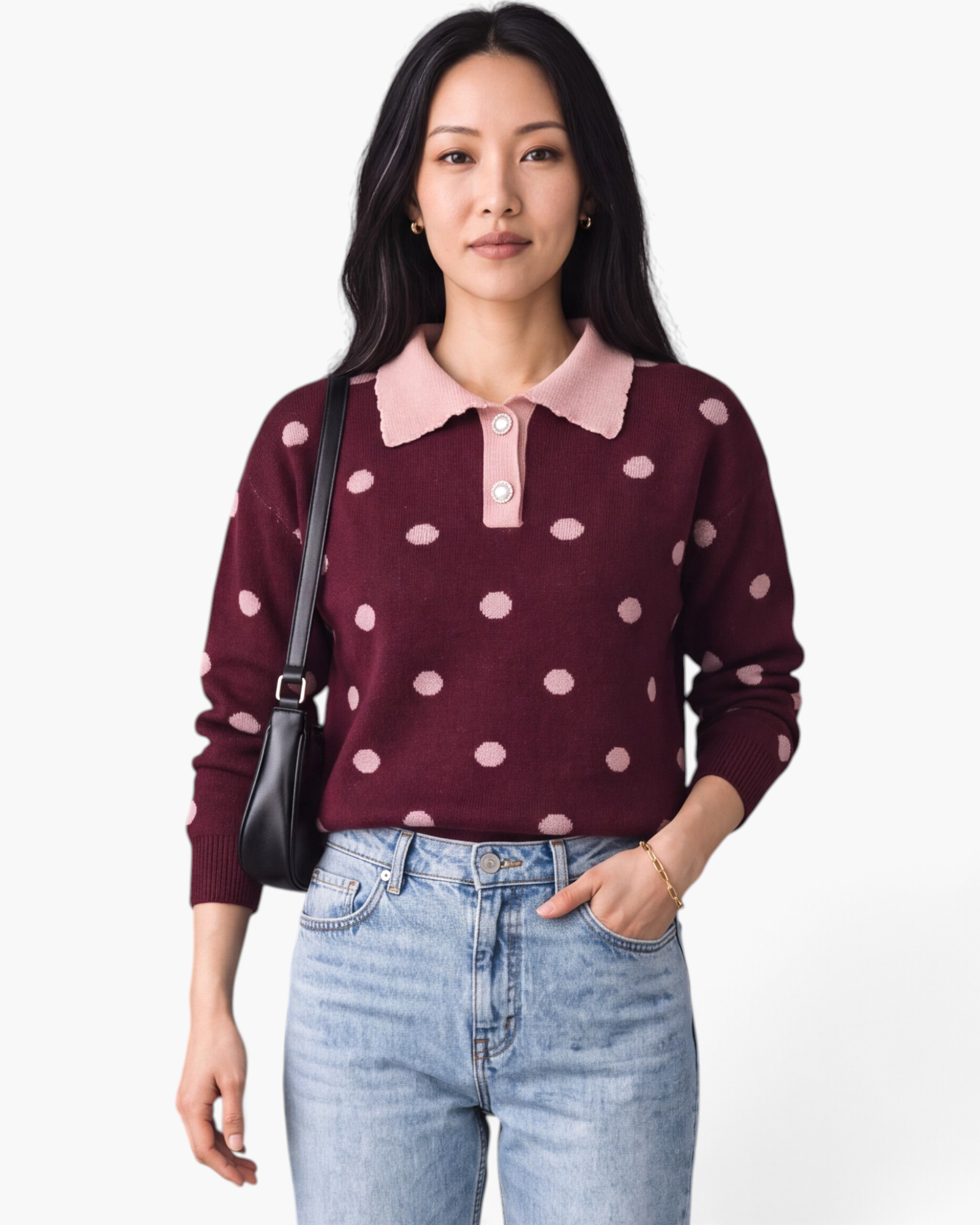 Model wearing Beach Rose Co. burgundy knit sweater with blush polka dots, contrast scalloped collar, and pearl buttons.