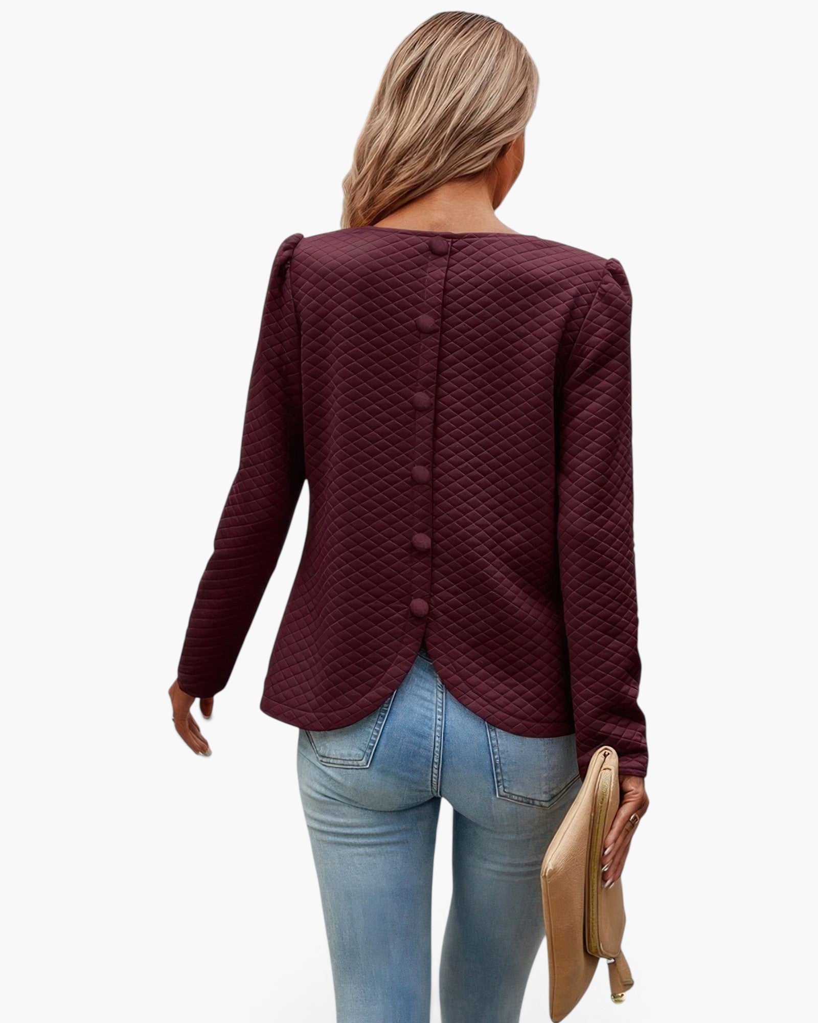 Beach Rose Co. burgundy quilted crewneck pullover with back button detail and ruffled hem worn with blue jeans