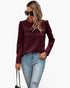 Beach Rose Co. burgundy quilted crewneck pullover with back ruffle detail worn by a woman with sunglasses and jeans