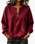 Beach Rose Co. burgundy ribbed quarter-zip pullover with dropped shoulders and banded cuffs on a woman