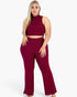 Beach Rose Co. plus size burgundy ribbed mock neck crop tank top and matching bootcut pants set on a blonde model.