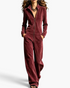 Beach Rose Co. burgundy velour jumpsuit with a zip-front, stand collar, long sleeves, and wide-leg silhouette.