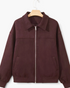 Beach Rose Co. burgundy zip-up jacket with a metal placket collar, long sleeves, and side pockets in a suede-like finish