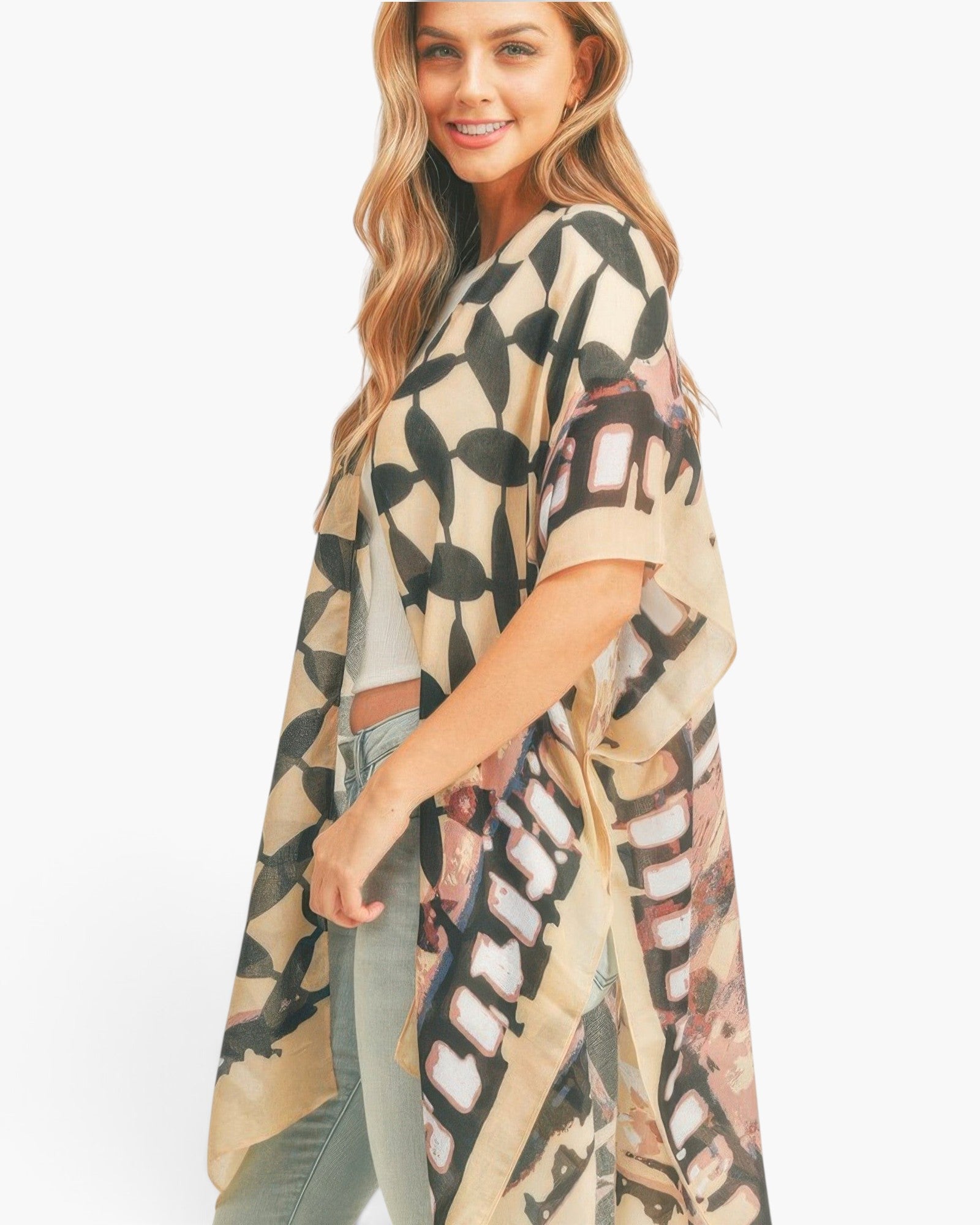 Beach Rose Co. lightweight kimono featuring a geometric butterfly wing print, worn by a smiling model.