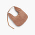 Beach Rose Co. camel faux suede bindle bag with a structured silhouette and a sturdy leather shoulder strap.