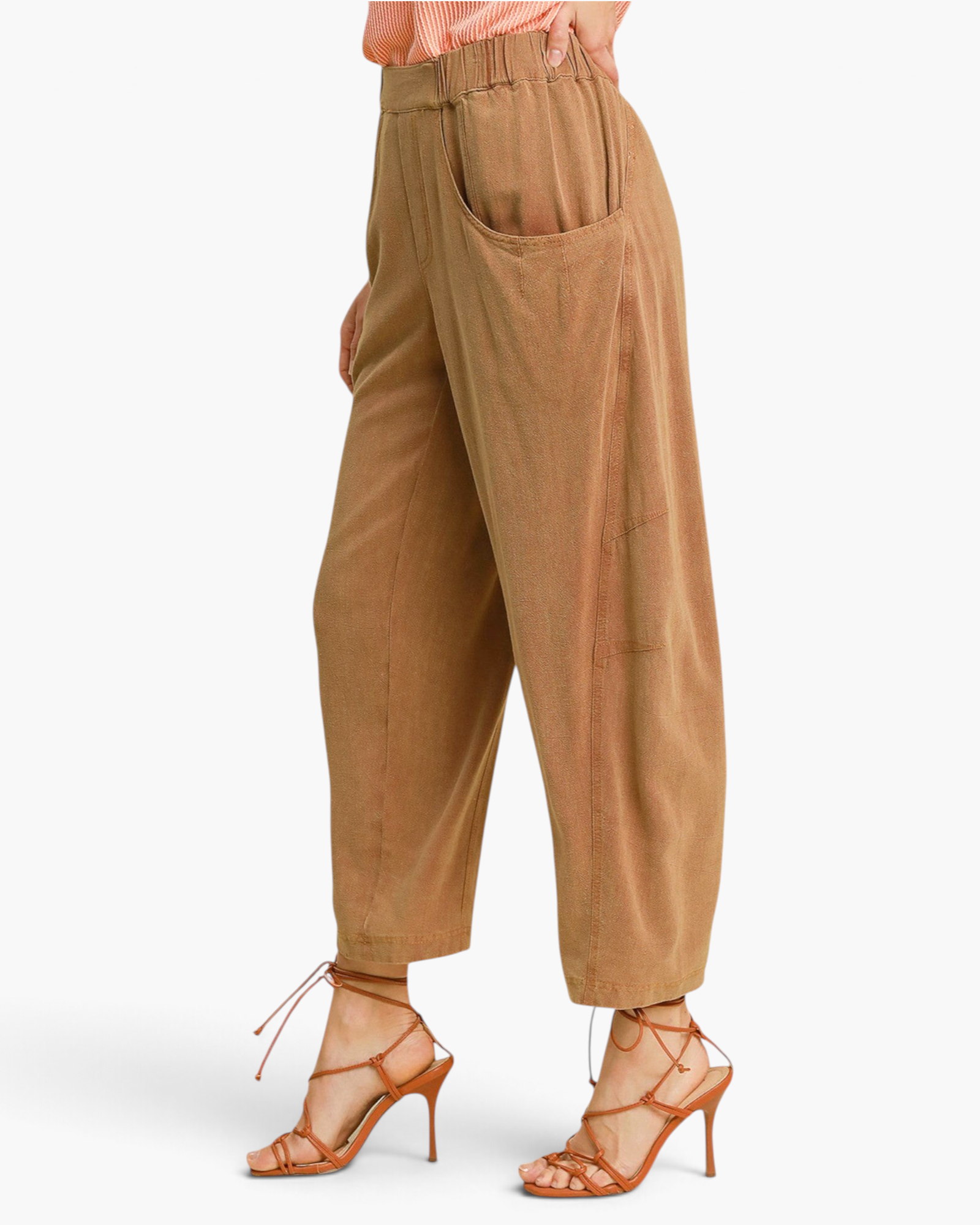 Beach Rose Co. camel linen-blend barrel-leg pants with oversized pockets and cropped length on a model in heels.