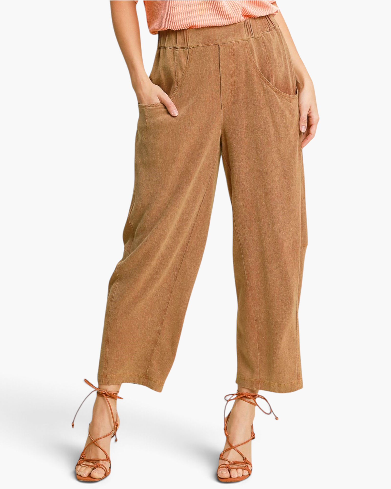 Beach Rose Co. camel linen-blend barrel-leg pants with oversized pockets and a cropped ankle-skimming length.
