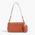 Beach Rose Co. camel quilted faux leather shoulder bag with a matching detachable Airpod pouch and chain strap.