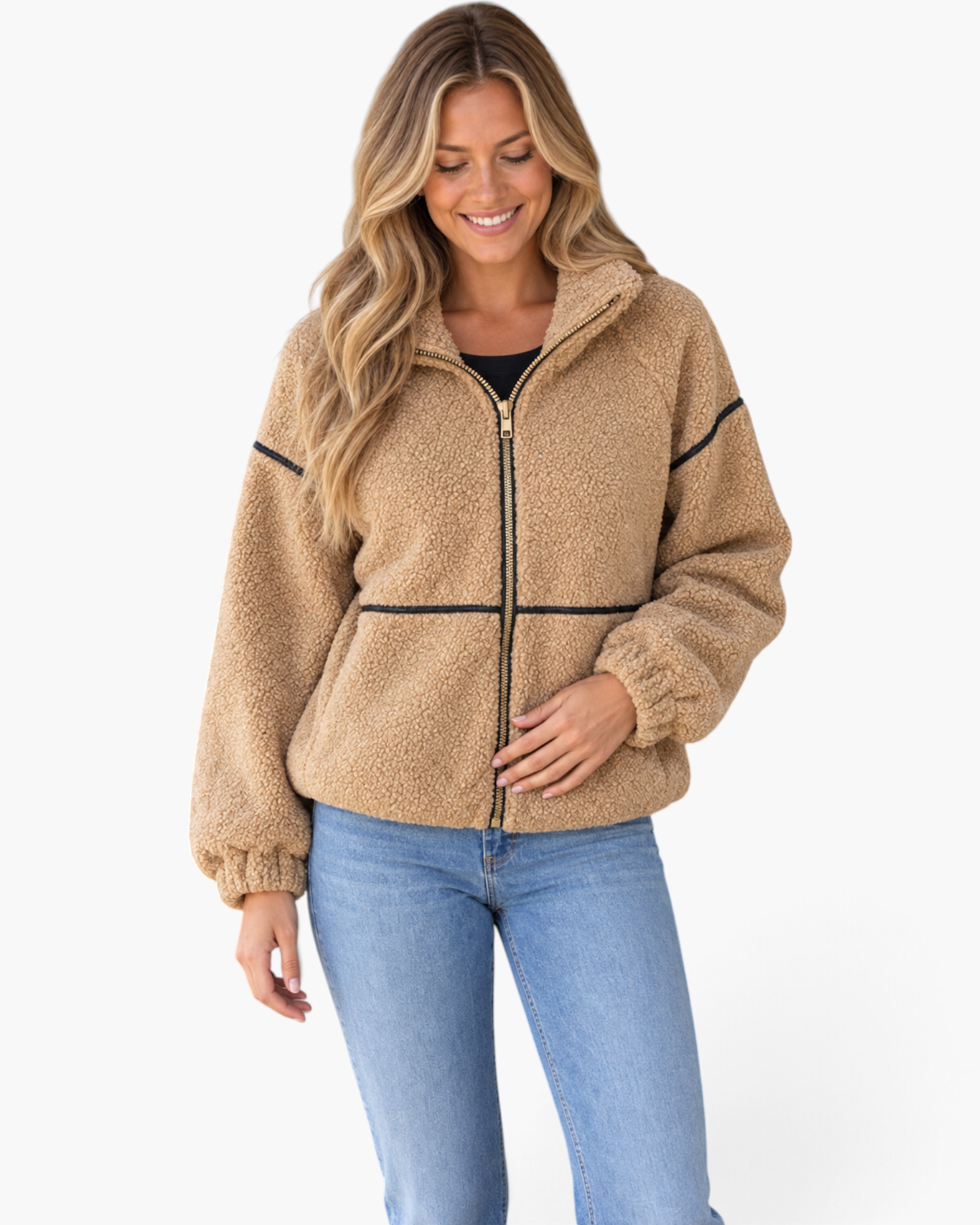 Beach Rose Co. camel sherpa jacket with black contrast trim, stand collar, and zip front worn by a smiling woman.