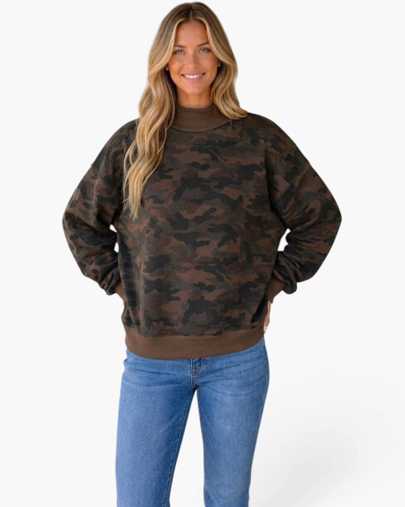 Beach Rose Co. model wearing a relaxed fit camouflage sweatshirt with a ribbed mock neck and brown trim.