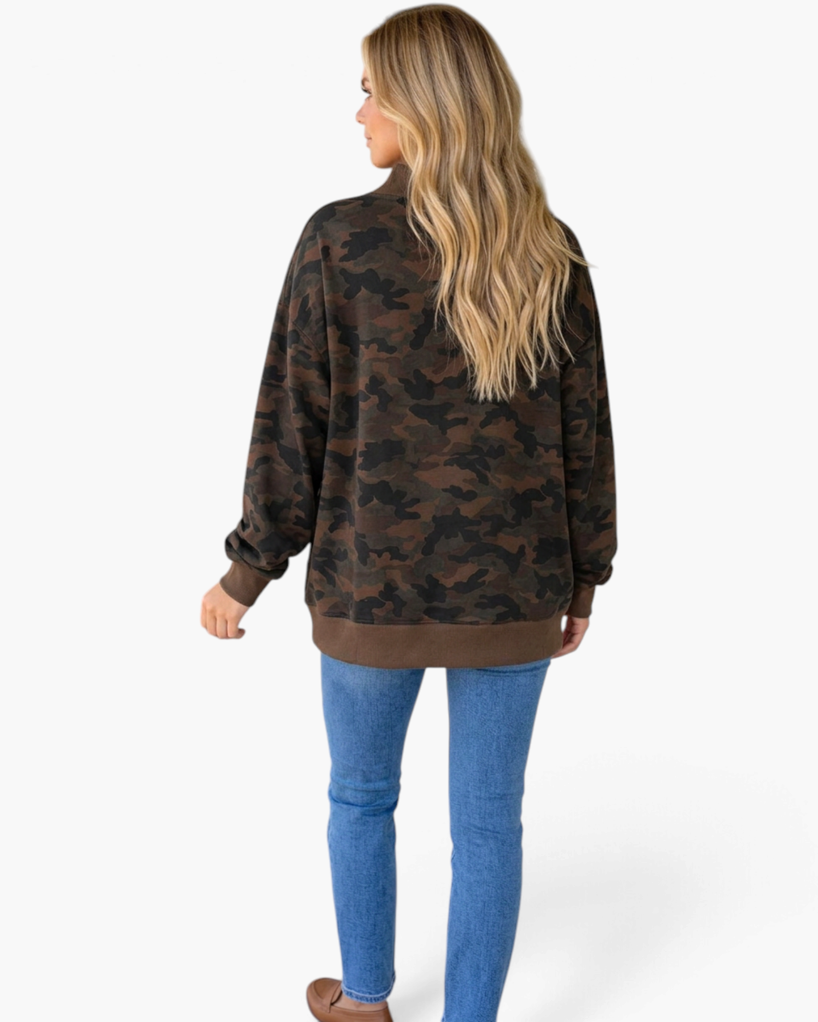 Beach Rose Co. camo sweatshirt with a relaxed fit, mock neck, and brown ribbed hem worn with blue jeans