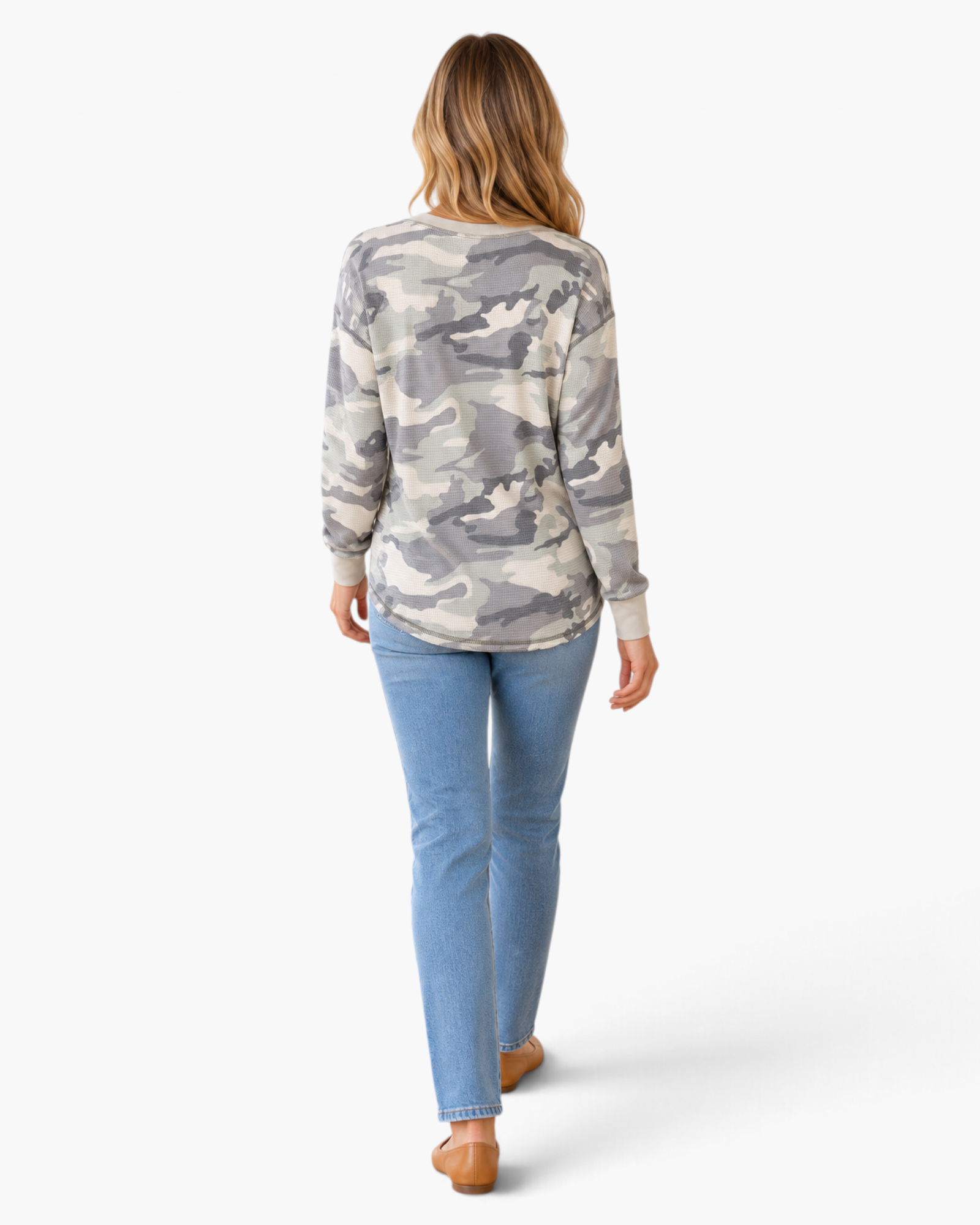 Beach Rose Co. sage and gray camo waffle knit long sleeve top with a curved hem worn with blue jeans, back view