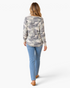 Beach Rose Co. sage and gray camo waffle knit long sleeve top with a curved hem worn with blue jeans, back view