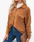Beach Rose Co. caramel textured button-front shacket with chest pockets and dropped shoulders on a model.