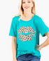 Beach Rose Co. cerulean short-sleeve graphic tee featuring a leopard-print lips design on soft stretch fabric.