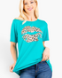 Beach Rose Co. cerulean short-sleeve graphic tee with a leopard-print lips design on soft stretch fabric