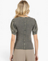 Beach Rose Co. charcoal washed ribbed top with puff sleeves, exposed back seam, and lettuce-edge hem, back view.