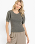 Beach Rose Co. charcoal washed ribbed puff sleeve top with exposed seams and lettuce-edge hem worn by a blonde model