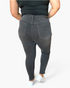 Beach Rose Co. high rise tummy control skinny jeans in charcoal grey with back pockets, worn by a model.