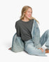 Beach Rose Co. charcoal stretch modal basic top worn by a blonde model layered under a denim jacket