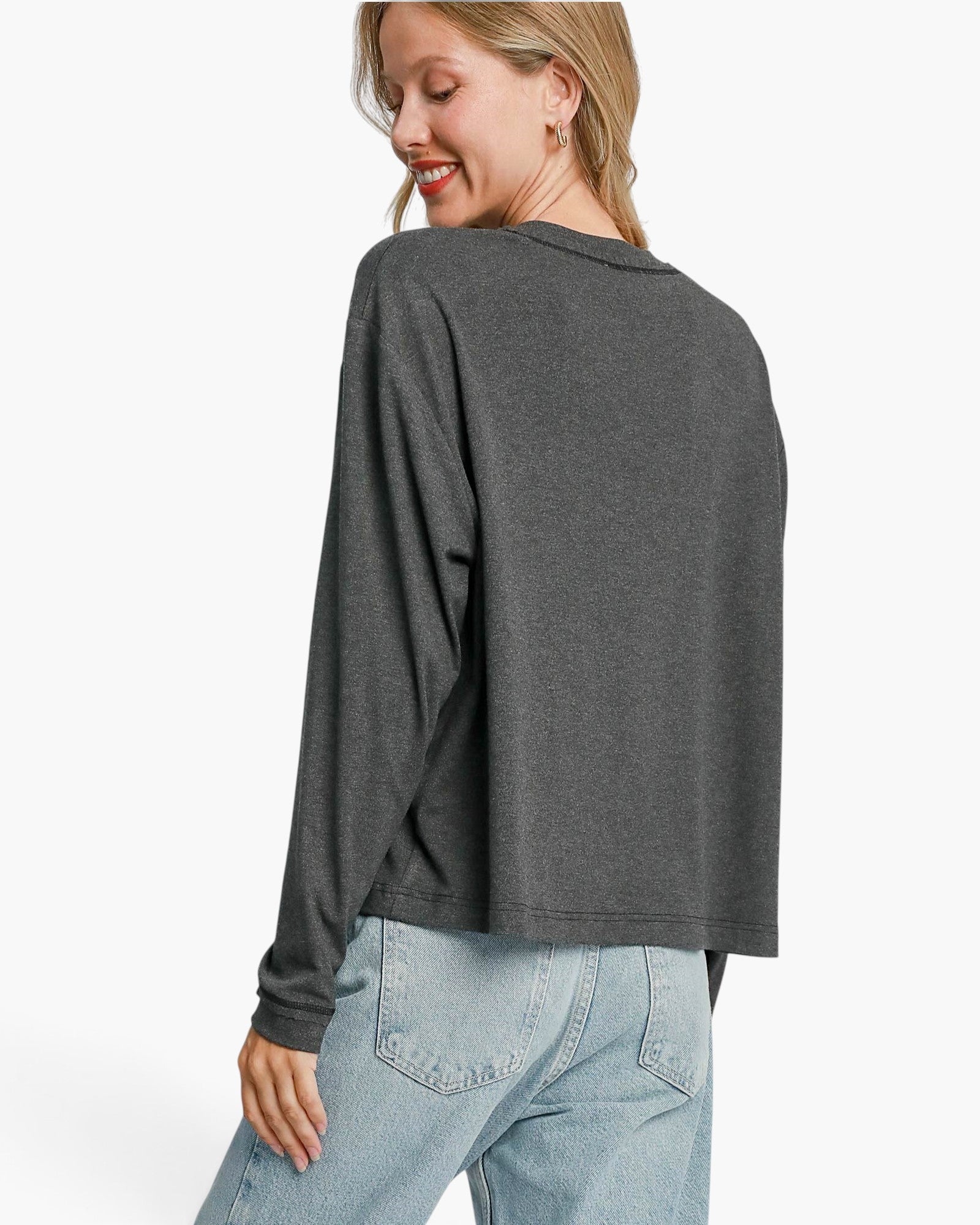 Beach Rose Co. charcoal grey long sleeve stretch modal top worn by a woman, showing a relaxed fit and soft fabric.