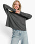 Beach Rose Co. charcoal stretch modal long sleeve top worn by a smiling woman with blonde hair