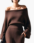 Beach Rose Co. chocolate brown off-shoulder ribbed knit sweater and midi skirt set with wide cuffs.