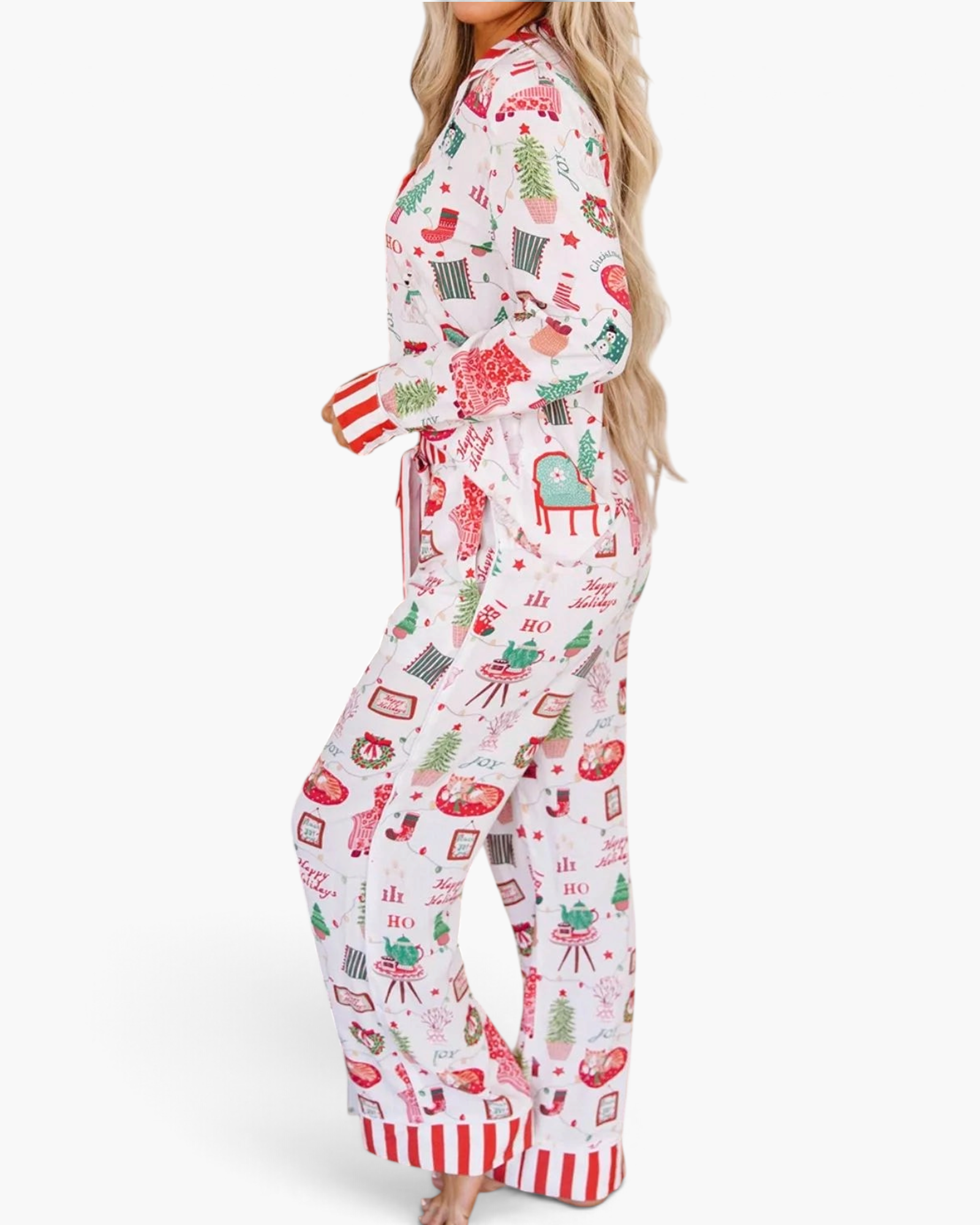 Beach Rose Co. white viscose pajama set with festive Christmas print and red striped trim on a model, side view.