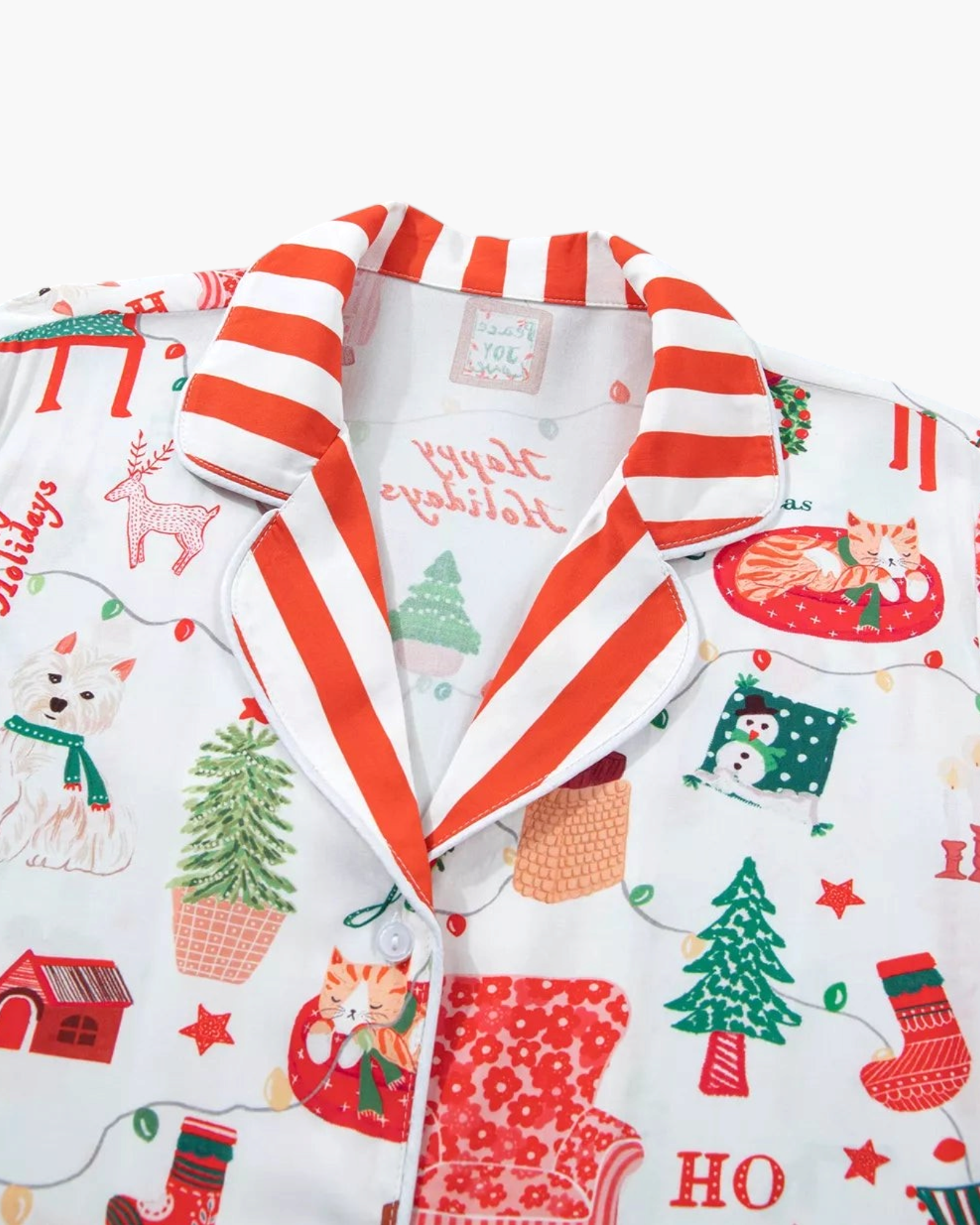 Beach Rose Co. white viscose pajama top with festive Christmas print and red and white striped notched collar trim.