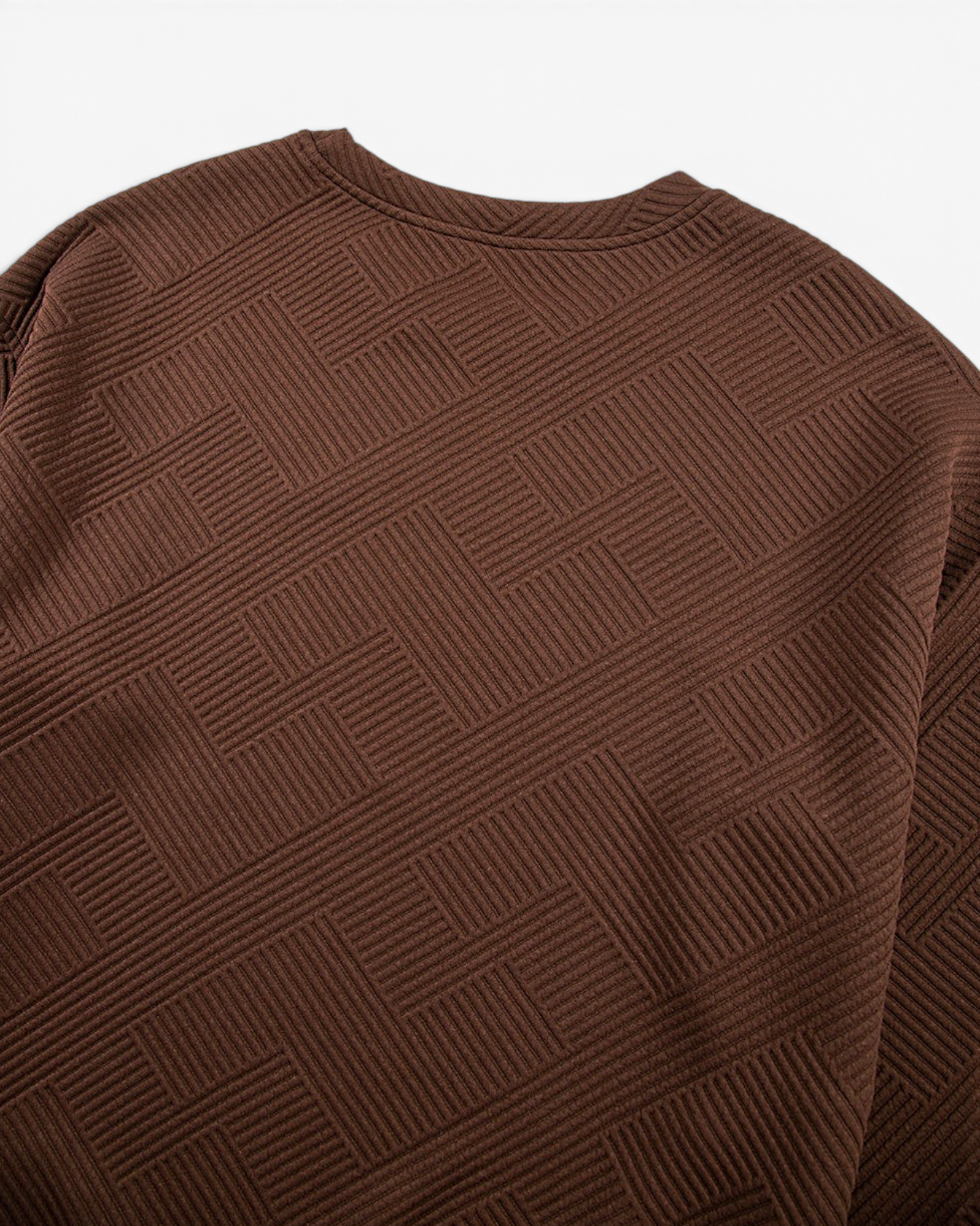 Beach Rose Co. coffee brown crew neck sweatshirt with an allover geometric textured pattern and ribbed collar.
