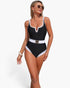 Beach Rose Co. one-piece swimsuit in black and white with a metal buckle belt and a flattering notched neckline.