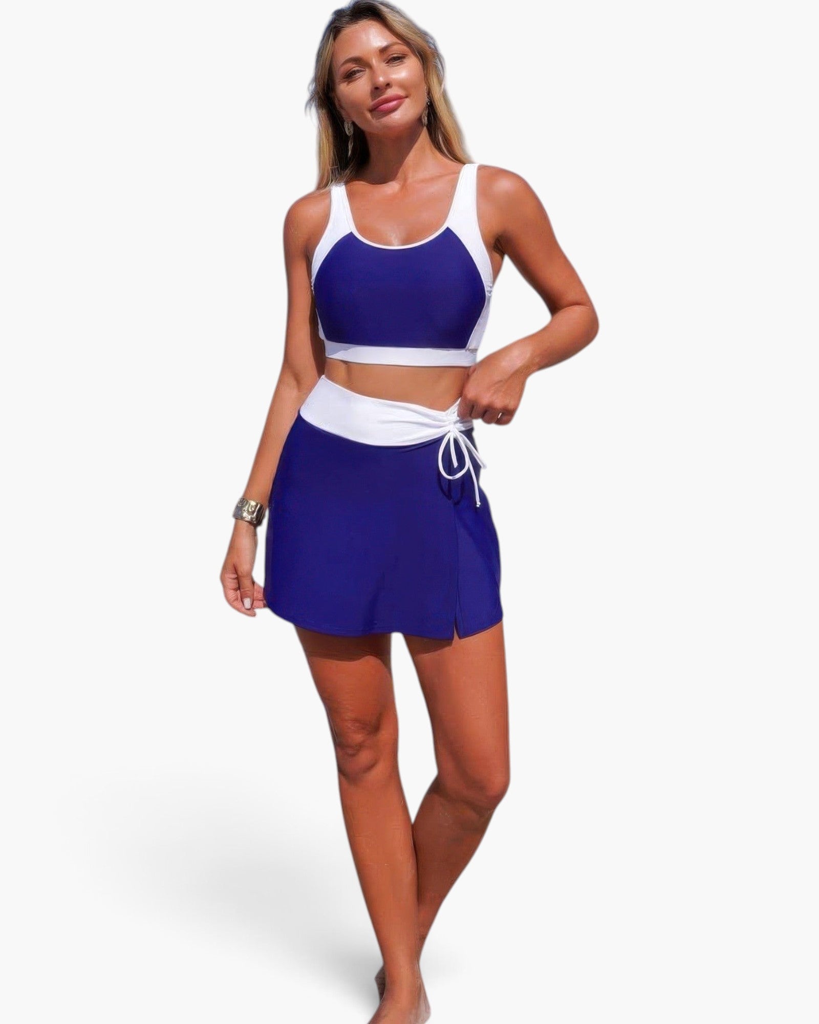 Beach Rose Co. two-piece color block bikini with a blue and white sports bra top and high-waisted skirted bottom.