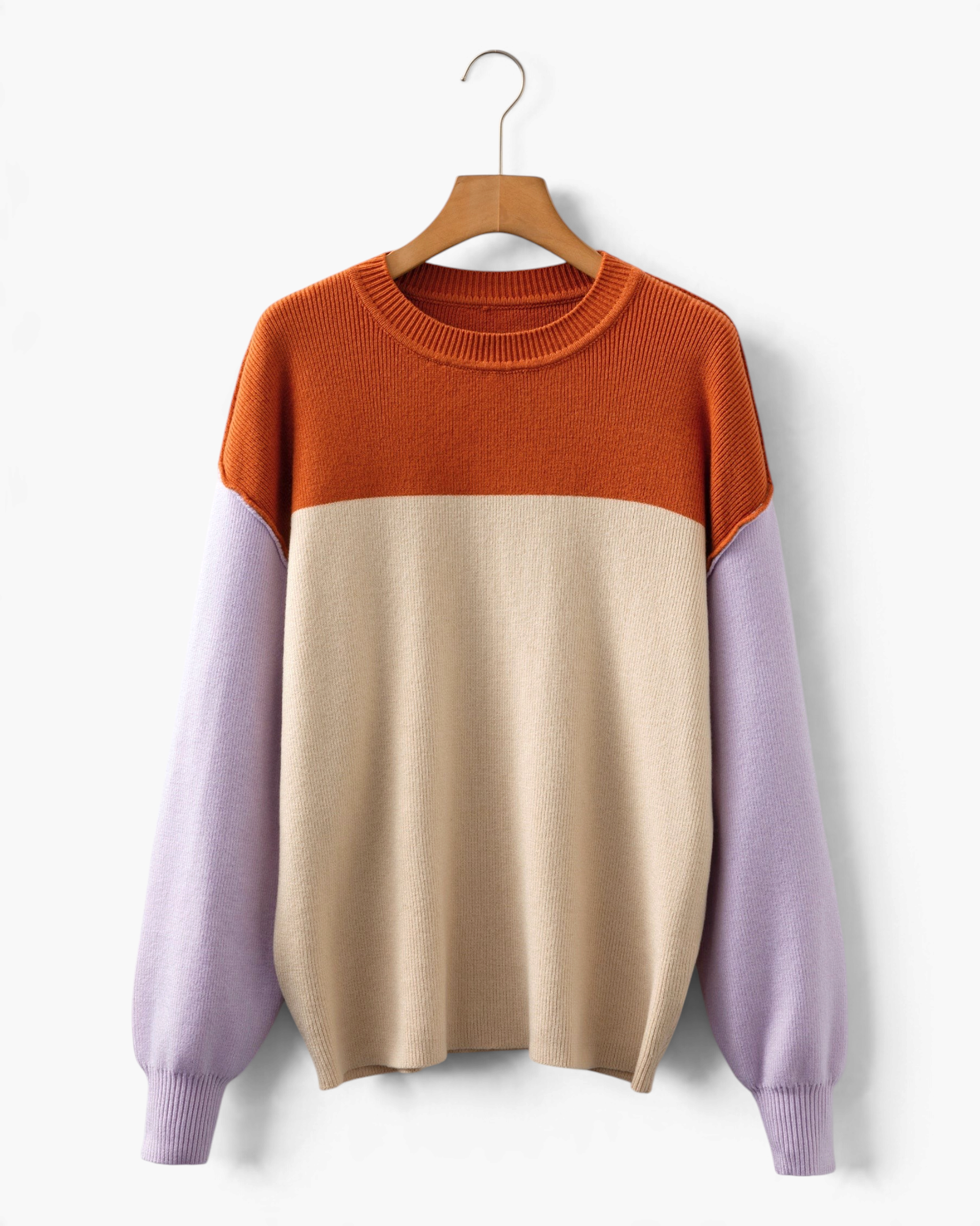 Beach Rose Co. color block sweater in rust, cream, and lavender with ribbed crew neck and dropped shoulders.
